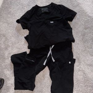 Black Yola pants with one pocket top